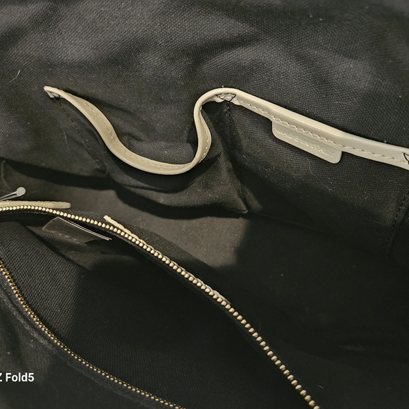 Burberry is a little over-sized crossbody with a top handle bag. Rarely used. - Picture 6 of 7
